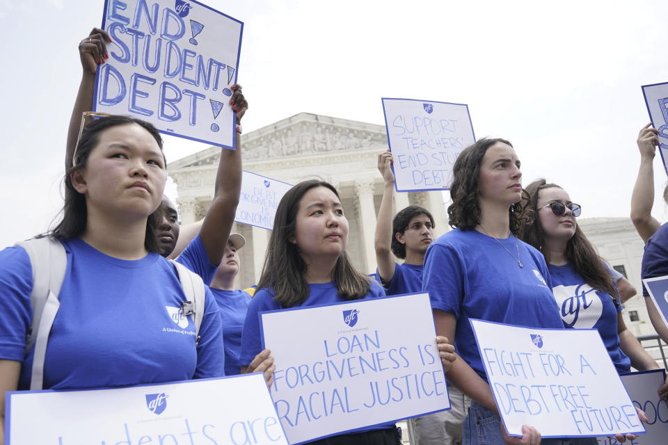 FILE - People demonstrate outside the Supreme Court, Friday, June 30, 2023, in Washington. Two conservative groups are asking a federal court to block the Biden administration’s plan to cancel $39 billion in student loans for more than 800,000 borrowers. (AP Photo/Jacquelyn Martin, File)