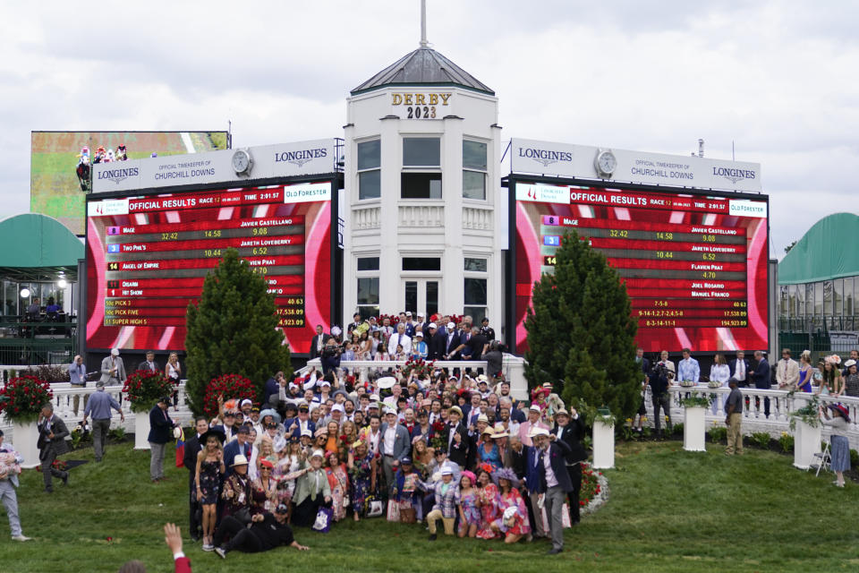 Javier Castellano celebrates in the winner's circle after riding Mage to win the 149th running of the Kentucky Derby horse race at Churchill Downs Saturday, May 6, 2023, in Louisville, Ky. (AP Photo/Jeff Roberson)