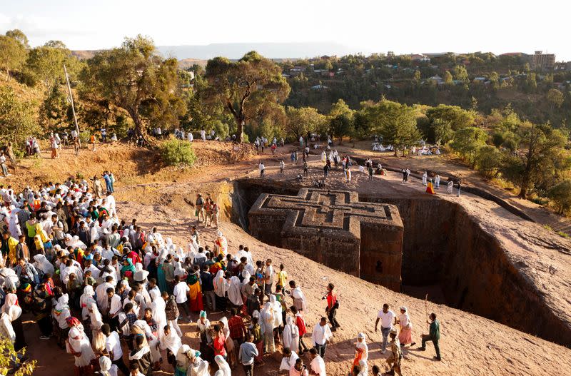 FILE PHOTO: Ethiopian Orthodox pilgrims wait to attend the Ethiopian Christmas Eve celebration at the St.George Rock-Hewn church in Lalibela