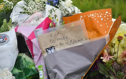 Pc Harper's death has prompted an outpouring of grief and flowers have been laid near the scene - Credit: Ben Birchall/PA