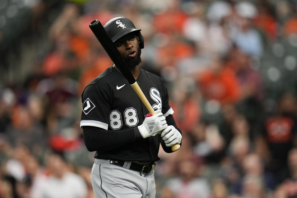 Chicago White Sox's Luis Robert Jr. reacts after striking out to end the top of the first inning of a baseball game against the Baltimore Orioles, Monday, Aug. 28, 2023, in Baltimore. (AP Photo/Julio Cortez)