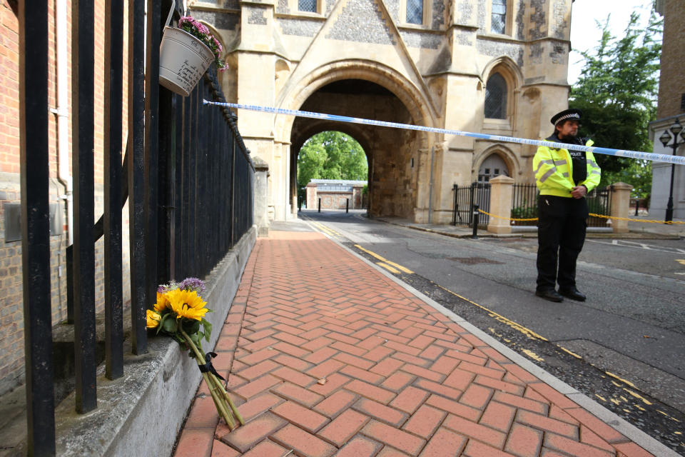 Police at the Abbey gateway of Forbury Gardens in Reading town centre following a multiple stabbing attack in the gardens which took place at around 7pm on Saturday leaving three people dead and another three seriously injured.