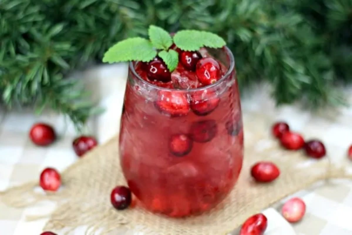 <p>Pam Beth</p><p>You are probably already buying cranberries for your meal, so have them pull double duty for this Cranberry Crush Cocktail. Using ingredients for more than one dish is not only easier, but helps keep the budget down!</p><p><strong>Get the recipe: <a href="https://parade.com/963012/pambeth/holiday-cranberry-crush-cocktail-recipe/" rel="nofollow noopener" target="_blank" data-ylk="slk:Cranberry Crush Cocktail;elm:context_link;itc:0;sec:content-canvas" class="link rapid-noclick-resp">Cranberry Crush Cocktail</a></strong></p>
