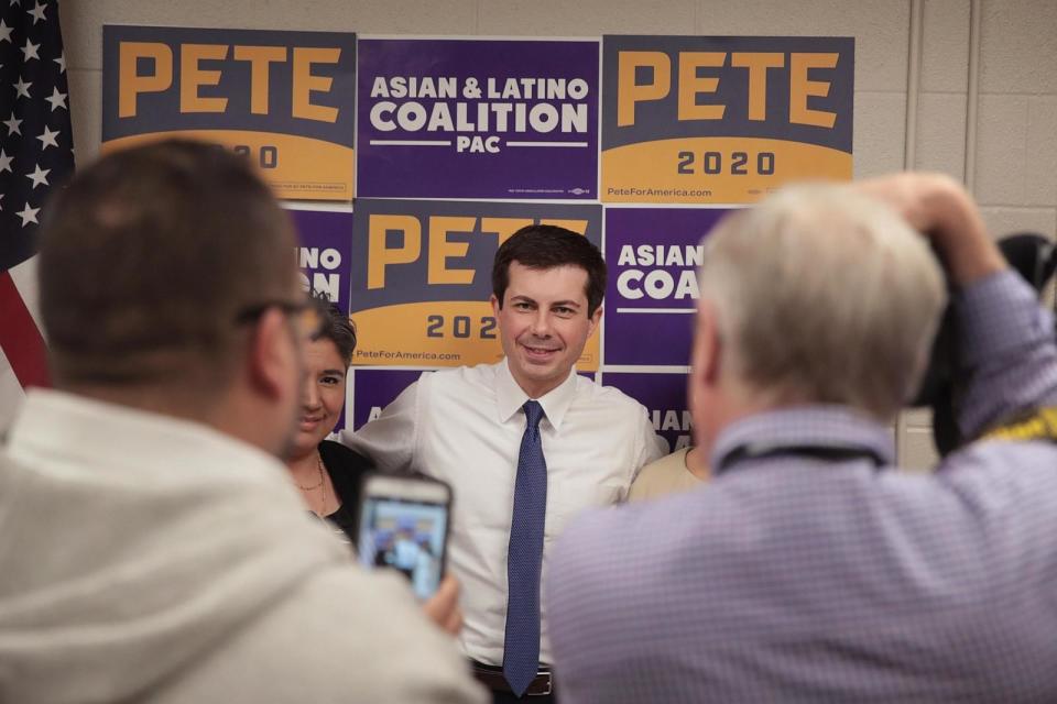 PHOTO: Democratic presidential candidate and South Bend, Indiana Mayor Pete Buttigieg greets guest after arriving at a campaign event hosted by the Asian Latino Coalition at the Machinists Hall, April 17, 2019, in Des Moines, Iowa.  (Scott Olson/Getty Images)