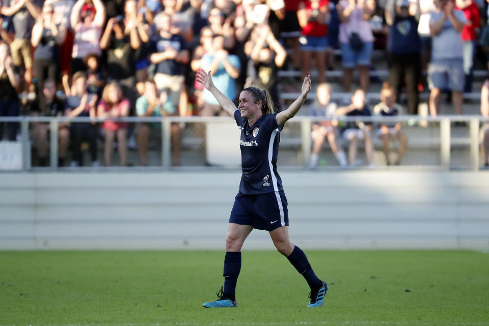 North Carolina Courage's Heather O'Reilly (17), center, leaves the filed during the second half of the NWSL championship soccer game against the Chicago Red Stars in Cary, N.C., Sunday, Oct. 27, 2019. (AP Photo/Karl B DeBlaker)