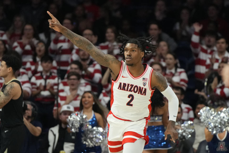 Arizona guard Caleb Love reacts after scoring against Colorado during the first half of an NCAA college basketball game, Thursday, Jan. 4, 2024, in Tucson, Ariz. (AP Photo/Rick Scuteri)