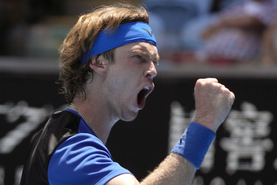 Andrey Rublev of Russia reacts after winning a point against Daniel Evans of Britain during their third round match at the Australian Open tennis championship in Melbourne, Australia, Saturday, Jan. 21, 2023. (AP Photo/Ng Han Guan)