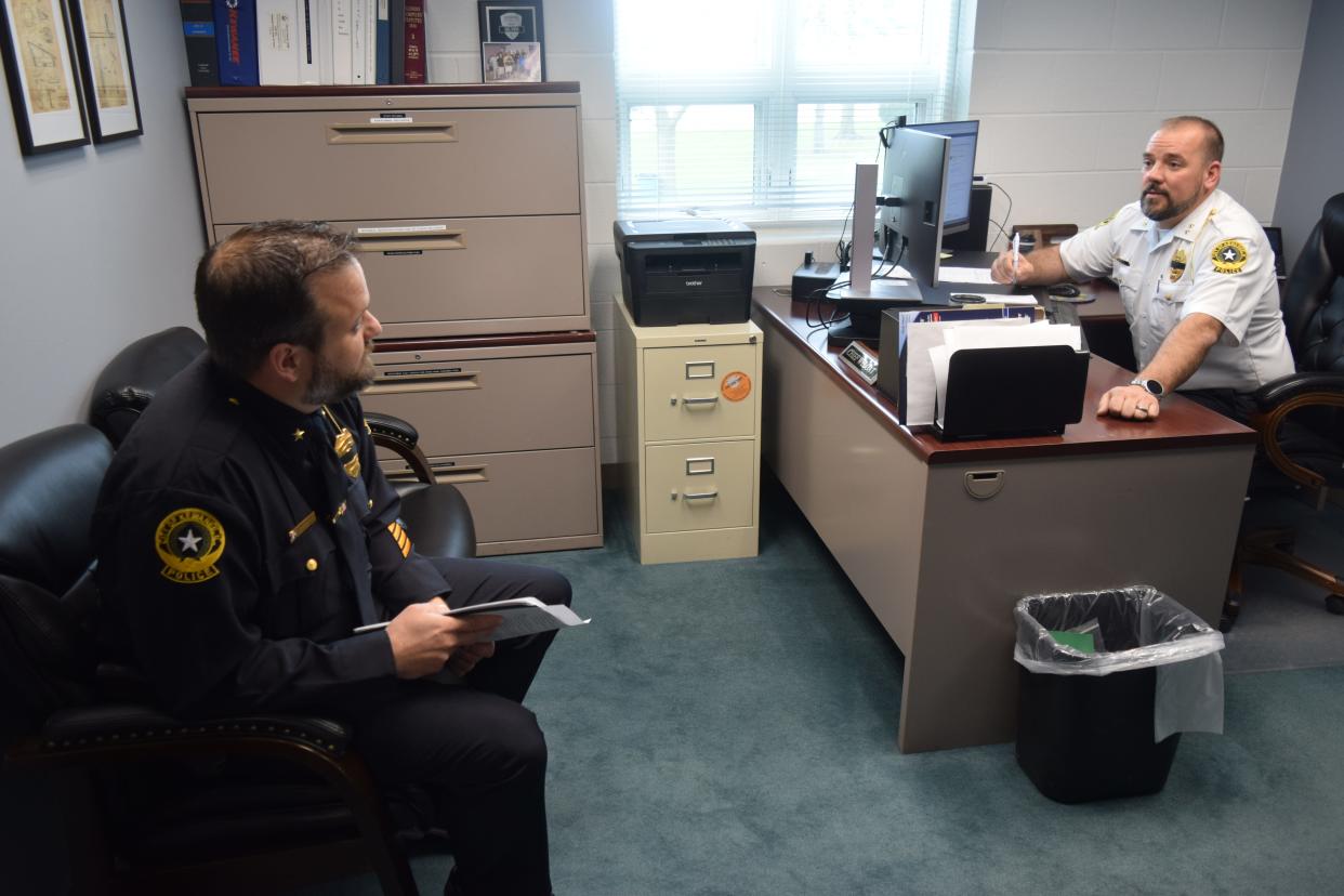 In this file photo, Deputy Police Chief Steve Kijanowski, left, confers with Police Chief Nicholas Welgat in Welgat;s office.