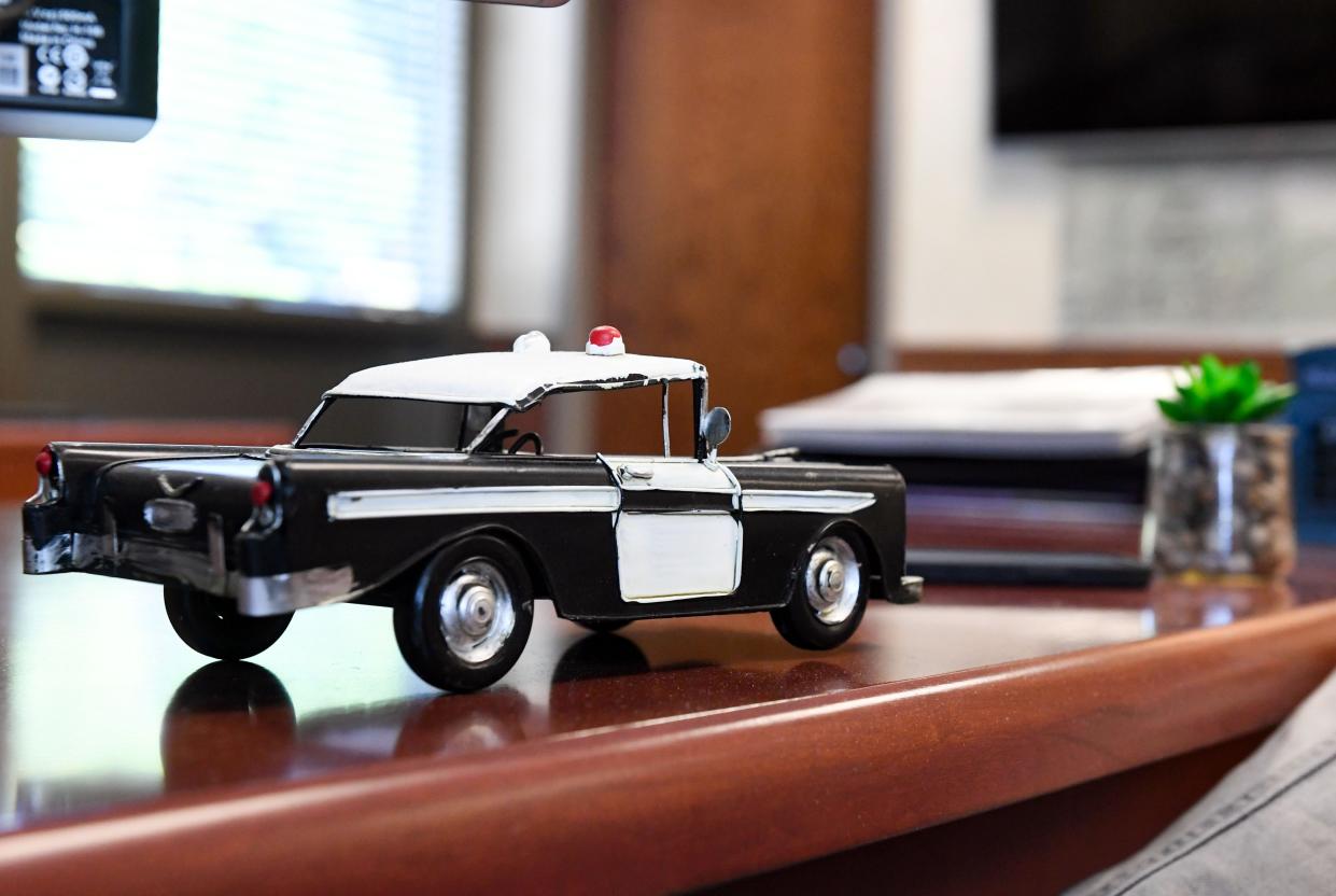 A model police car sits on a desk in 2021 at the Sioux Falls Law Enforcement Center.