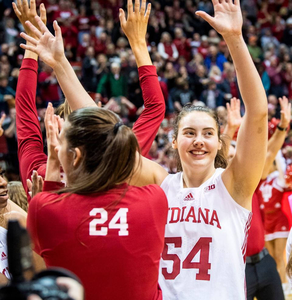 Indiana's Mackenzie Holmes (54) waves to the crowd after the second half of the Indiana versus Ohio State women's basektball game at Simon Skjodt Assembly Hall on Thursday, Jan. 26, 2023.