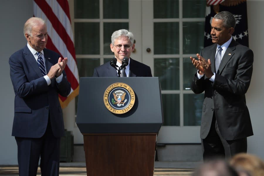 U.S. President Barack Obama (right) and Vice President Joe Biden (left) stand with Judge Merrick B. Garland (right), while nominating him to the U.S. Supreme Court, in the Rose Garden at the White House, March 16, 2016, in Washington, D.C. (Photo by Chip Somodevilla/Getty Images)