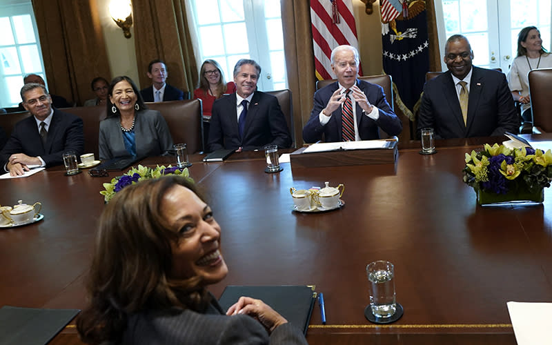 Vice President Harris smiles as President Biden holds a Cabinet meeting
