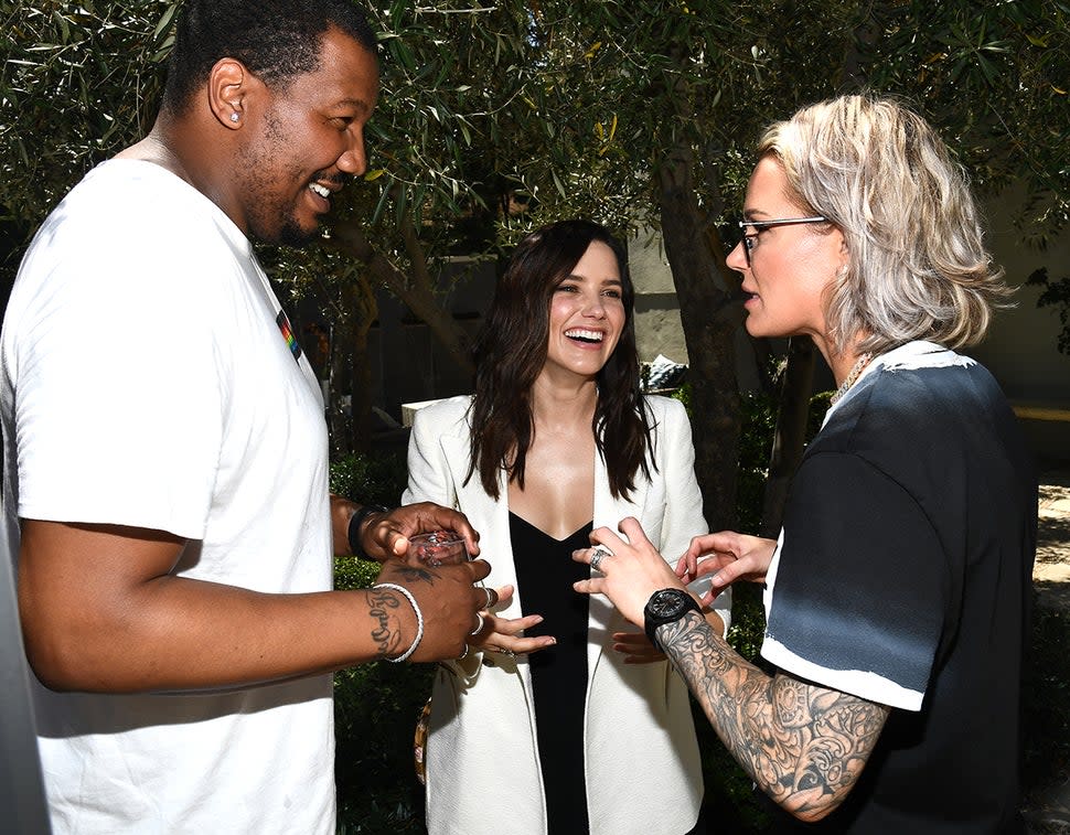 Sophia Bush and Ashlyn Harris chat with Travon Free at the U.S. Women's Soccer Team Brunch on Aug. 4, 2019.
