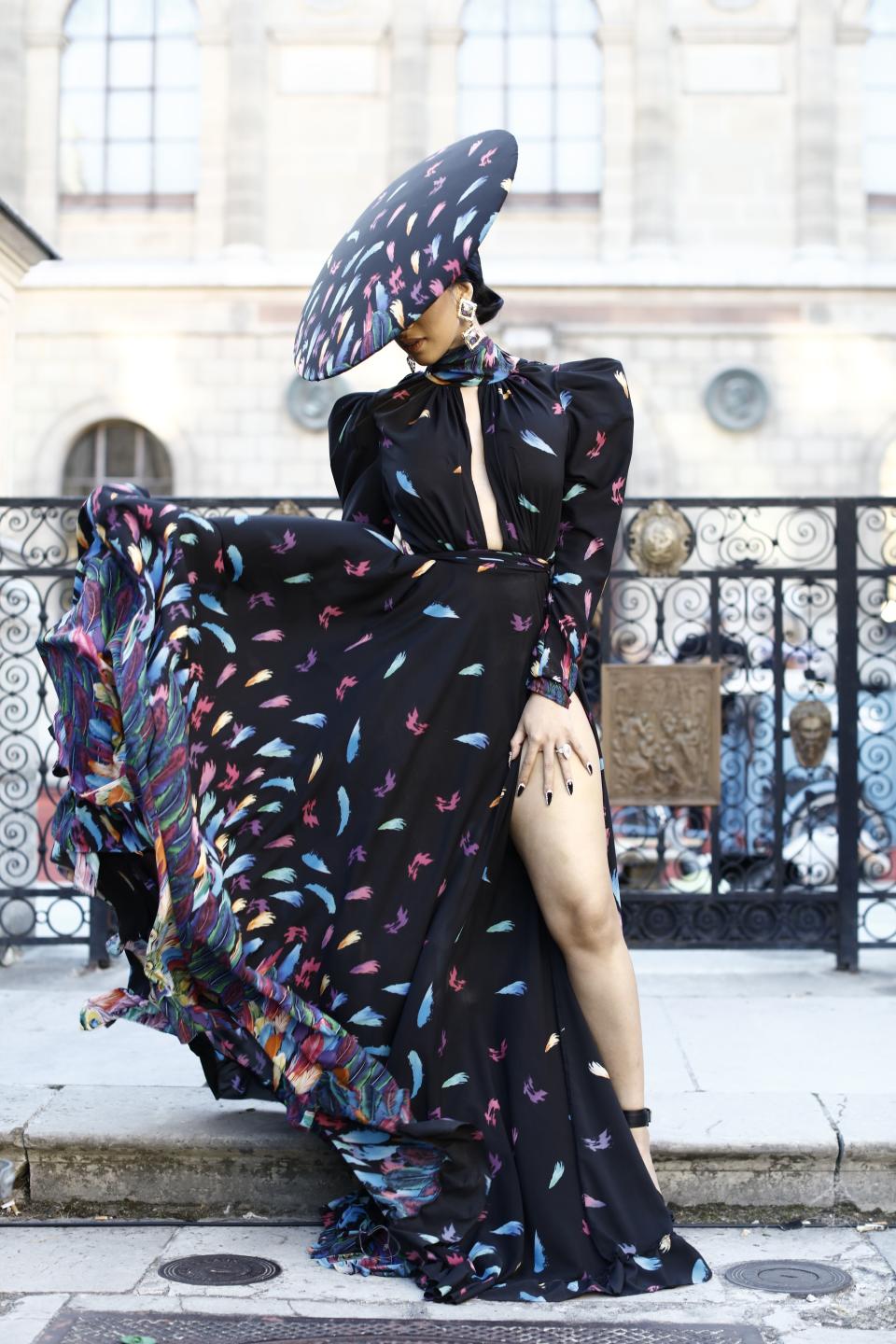 Cardi B has landed at Paris Fashion Week—and she already demonstrated how you make an entrance at a fashion show.