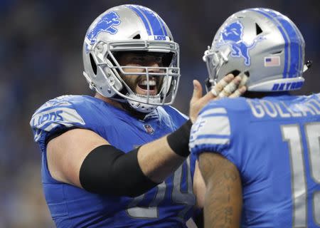 FILE PHOTO: Sep 10, 2017; Detroit, MI, USA; Detroit Lions center Travis Swanson (64) celebrates with wide receiver Kenny Golladay (19) after a touchdown during the fourth quarter against the Arizona Cardinals at Ford Field. Raj Mehta-USA TODAY Sports