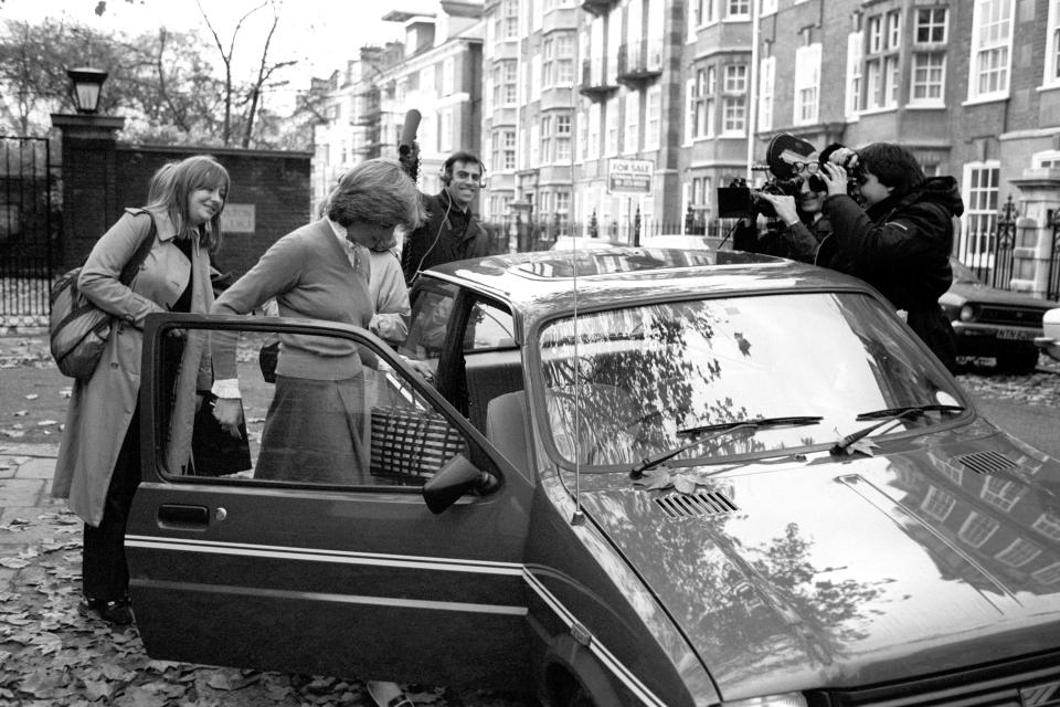 Lady Diana Spencer, surrounded by the media, leaving her Earl's Court flat in her bright new mini metro en route to her job as a teacher at a kindergarten in nearby Pimlico.   (Photo by PA Images via Getty Images)