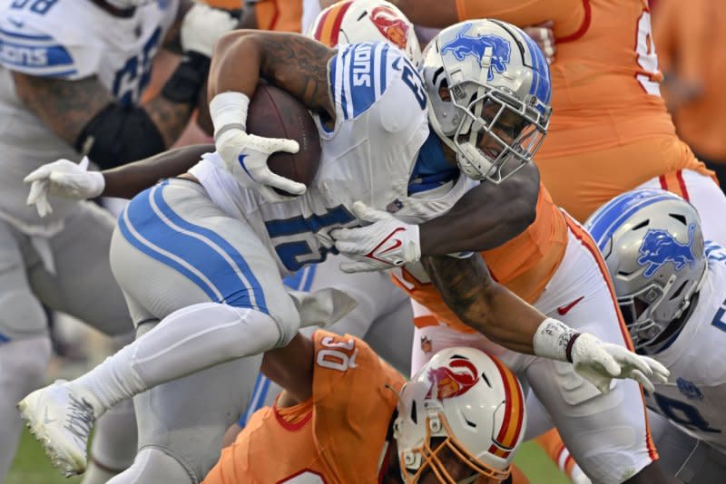 Detroit Lions running back Craig Reynolds carries the ball against the Tampa Bay Buccaneers on Sunday at Raymond James Stadium in Tampa, Fla. Photo by Steve Nesius/UPI