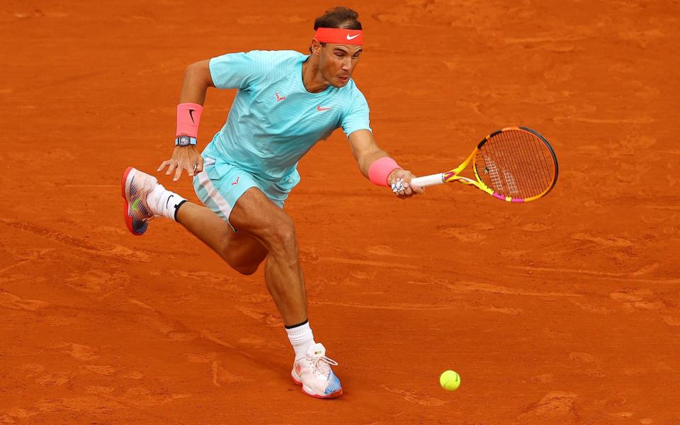 Rafael Nadal of Spain plays a forehand during his Men's Singles first round match against Egor Gerasimov of Belarus  -  Julian Finney/Getty Images