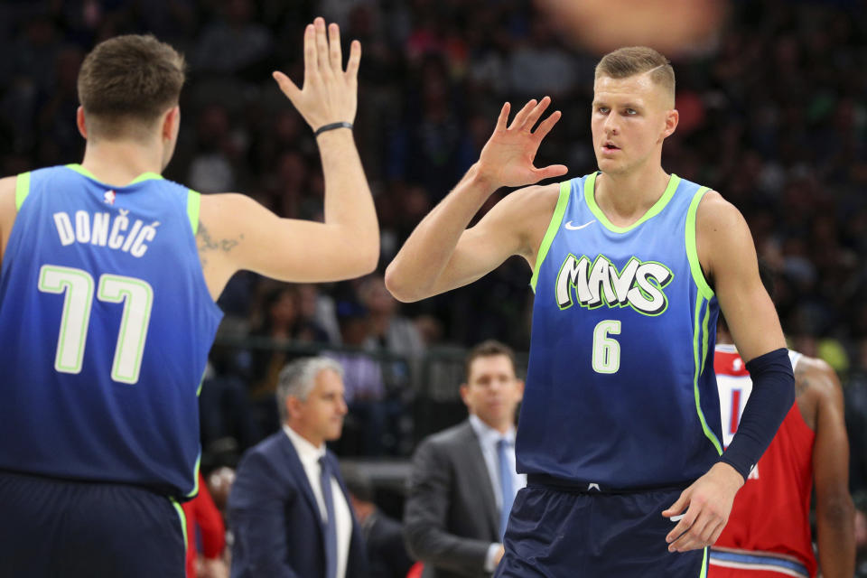 This Kristaps-Luka experiment looks like it might work. (AP Photo/Richard W. Rodriguez)