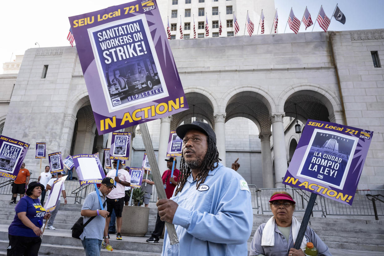 Los Angeles city employees with SEIU Local 721 picket outside of City Hall in Los Angeles