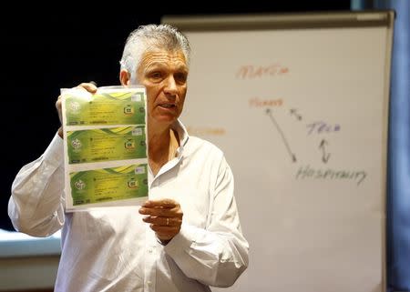 Former Israeli soccer player and hospitality ticket agent Benny Alon speaks to media during a news conference in Zurich, Switzerland September 17, 2015. REUTERS/Ruben Sprich