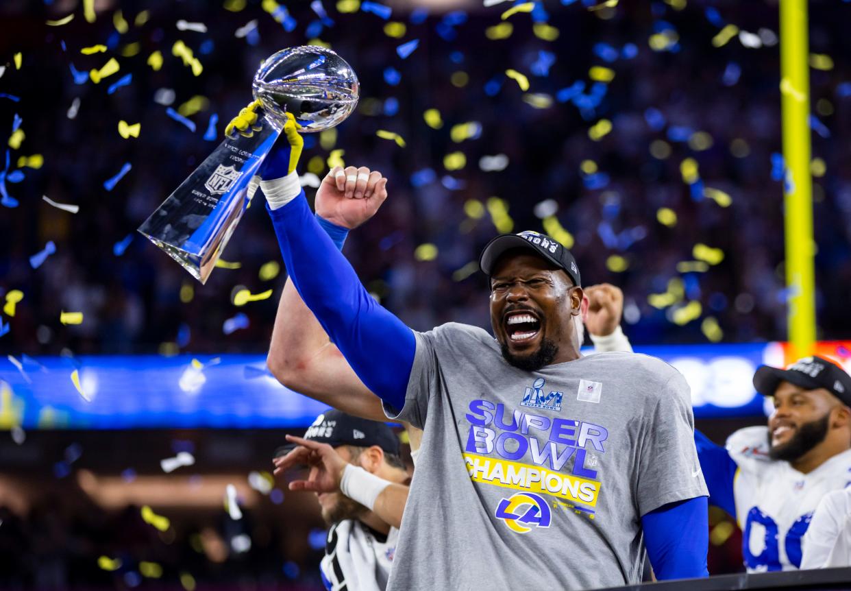 Los Angeles Rams linebacker Von Miller celebrates with the Vince Lombardi Trophy after defeating the Cincinnati Bengals during Super Bowl LVI at SoFi Stadium on Feb. 13.