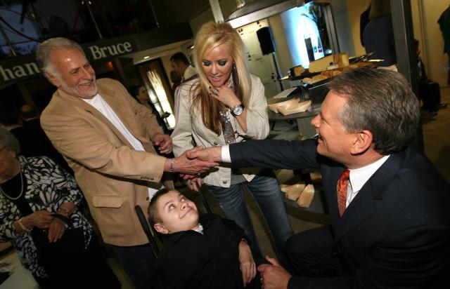 KSL-TV anchor Bruce Lindsay is greeted by former KSL anchor Dick Nourse and his family during a retirement reception in Lindsay’s honor on May 23, 2012, at KSL Broadcast House in Salt Lake City. | Chuck Wing, Deseret News
