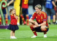 Fernando Torres of Spain speaks with his daughter Nora Torres after the UEFA EURO 2012 final match between Spain and Italy at the Olympic Stadium on July 1, 2012 in Kiev, Ukraine. (Photo by Jasper Juinen/Getty Images)