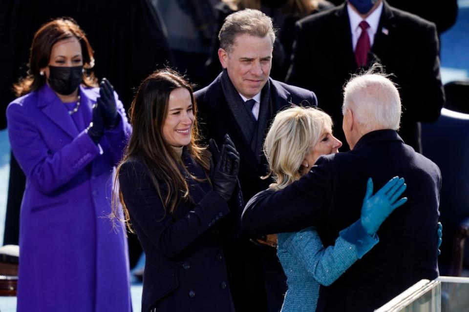 Ashley Biden and Hunter Biden look on as Joe Biden embraces his wife Jill Biden during his presidential inauguration (Getty Images)