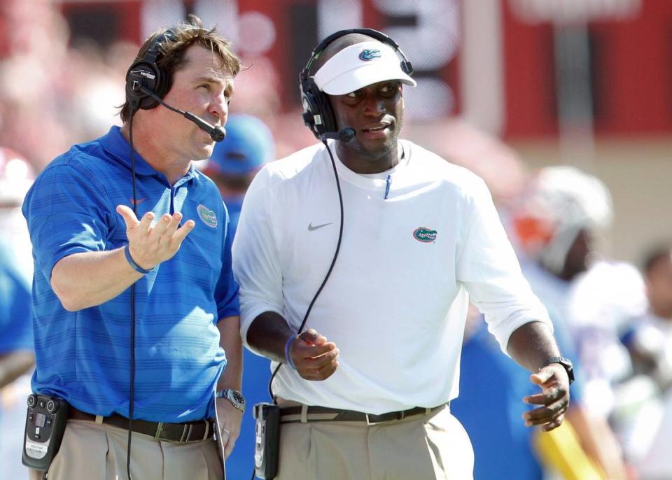 Sep 20, 2014; Tuscaloosa, AL, USA; Florida Gators head coach Will Muschamp (left) and Travaris Robinson during the game against the Alabama Crimson Tide at Bryant-Denny Stadium. Mandatory Credit: Marvin Gentry-USA TODAY Sports