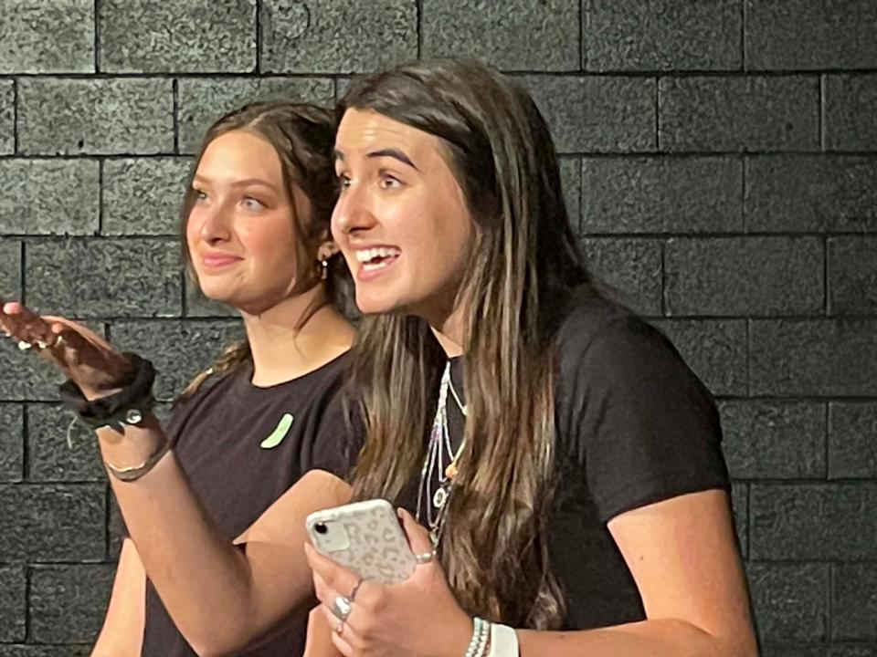 Virginia Klenske and Jasmyne Baker announce the show to a packed house of family who came to see their little one perform on stage at the annual Drama Camp finale held at Farragut High School Friday, July 29, 2022.