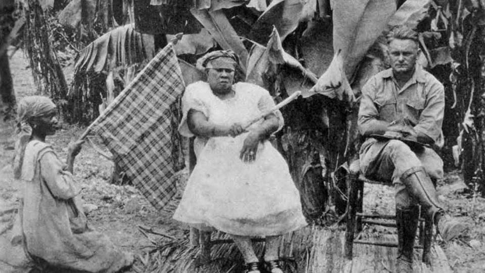 Wirkus (King Faustin II) sitting next to his queen, Ti Memenne. (USMC/Gray Research Center)