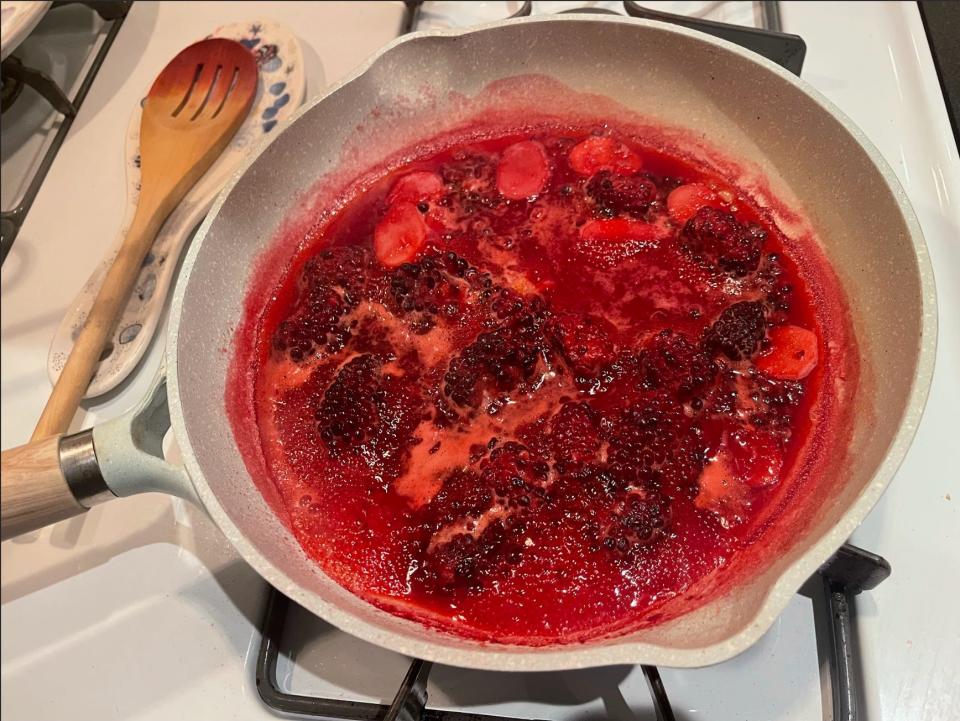 Blackberry glaze in a pan.