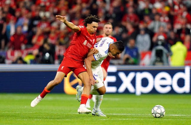 Trent Alexander-Arnold and Casemiro battle for the ball