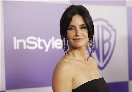 Actress Courteney Cox poses at the Warner Bros./InStyle after party after the 67th annual Golden Globe Awards in Beverly Hills, California in this January 17, 2010 file photo. REUTERS/Mario Anzuoni/Files