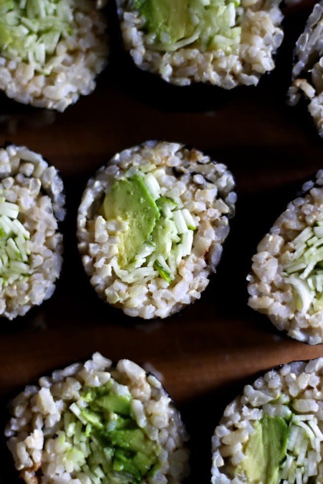 <strong>Get the <a href="http://www.thisrawsomeveganlife.com/2014/12/avocado-zucchini-sushi-with-brown-rice.html#.VNz0ZrBgIkQ" target="_blank">Avocado Zucchini Brown Rice Sushi recipe</a> from The Rawesome Vegan Life</strong>
