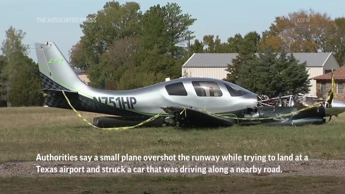 Small plane crashes into car after overshooting runway during