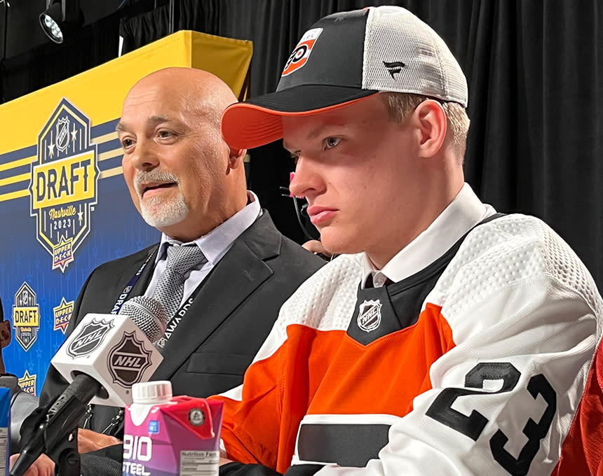 Flyers amateur scout Ken Hoodikoff and seventh overall pick Matvei Michkov address the media at the NHL draft in late June.