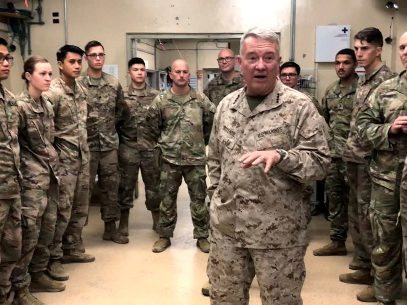 FILE PHOTO: Marine General Kenneth McKenzie speaks with U.S. troops while visiting Forward Operating Base Fenty in Jalalabad, Afghanistan