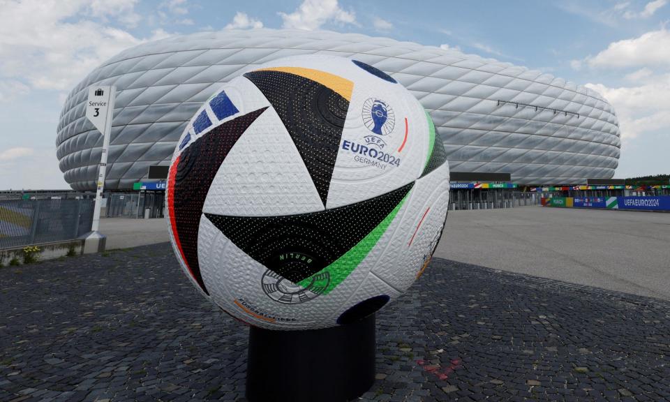 <span>A giant replica football in Munich as the tournament prepares to kick off around Germany.</span><span>Photograph: Michaela Stache/Reuters</span>