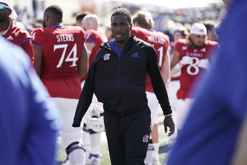 LAWRENCE, KANSAS - OCTOBER 08:  Quarterback Jalon Daniels #6 of the Kansas Jayhawks walks the sideline in the second half during a game against the TCU Horned Frogs at David Booth Kansas Memorial Stadium on October 08, 2022 in Lawrence, Kansas. (Photo by Ed Zurga/Getty Images)