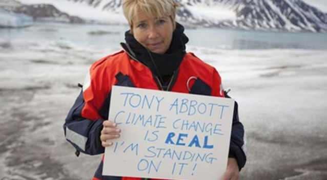 British actor Emma Thompson has been photographed holding a sign slamming world leaders, including Australian Prime Minister Tony Abbott. Photo: AP