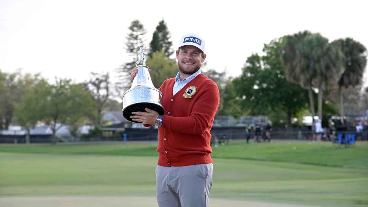 Mandatory Credit: Photo by Phelan M Ebenhack/AP/Shutterstock (10591860v)Tyrrell Hatton, of England, poses with the championship trophy after winning the Arnold Palmer Invitational golf tournament, in Orlando, FlaBay Hill Golf, Orlando, United States - 08 Mar 2020.