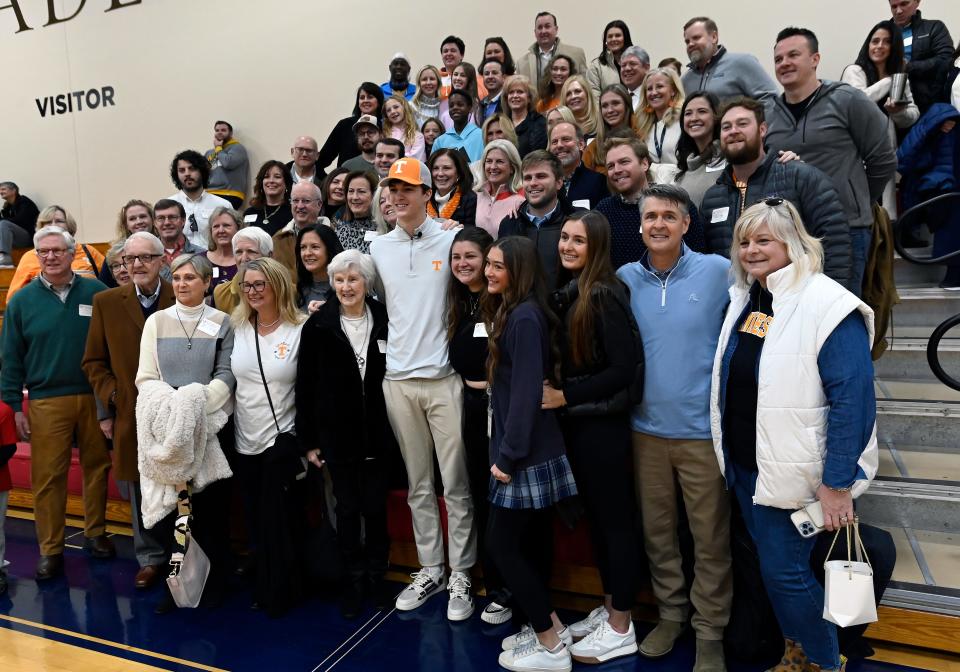 Brentwood Academy quarterback George McIntyre stands with family and friends after announcing his commitment to the University of Tennessee during a ceremony at Brentwood Academy on Monday, Jan. 22, 2024 in Brentwood, Tenn. MacIntyre is the number 3-ranked quarterback for the class 2025.