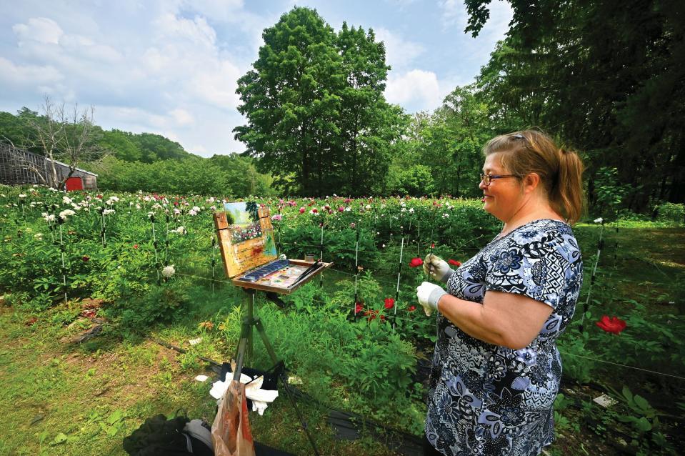 Carrin Culotta of Townsend paints the scene with a group from Central Massachusetts Plein Air Painters.