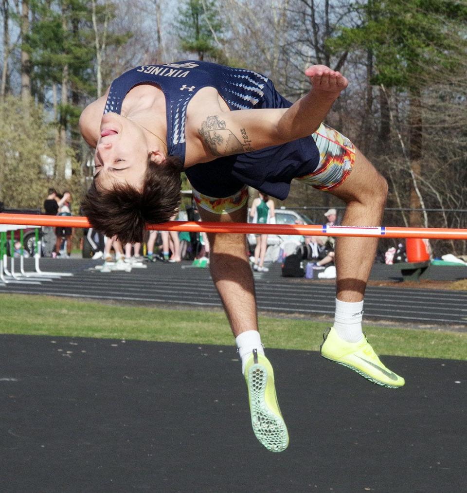 Brennan Shea of East Bridgewater successfully makes his high jump of 5'2" during the track meet at Abington on Wednesday, April 12, 2023.