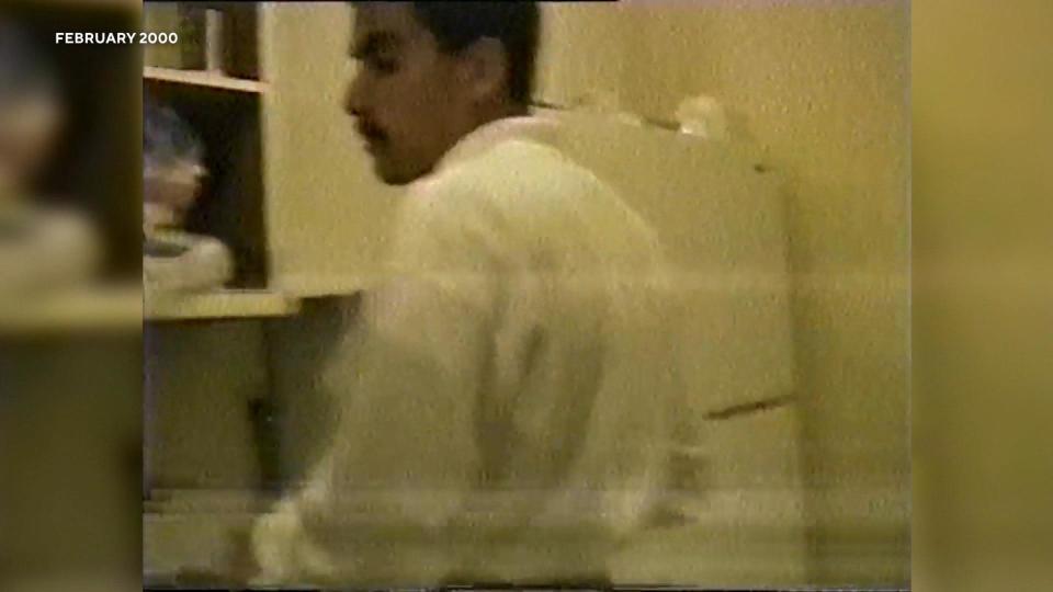 Khalid al-Mihdhar, one of the first two hijackers to arrive in the U.S. in January 2000, is seen in the kitchen at a party.  