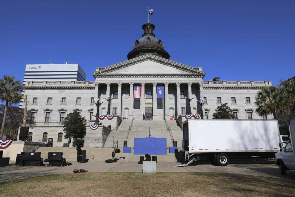 Workers prepare the Statehouse the day before Gov. Henry McMaster's inauguration on Tuesday, Jan. 10, 2023, in Columbia, S.C.(AP Photo/Jeffrey Collins)