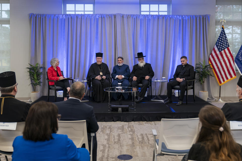 Archbishop Yevstratiy Zorya, center left, speaks during a panel discussion among an interfaith delegation of Ukrainian religious leaders including Mufti Akhmed Tamim, center, Rabbi Yaakov Dov Bleich, center right, Bishop Ivan Rusyn, right, while former US ambassador to Ukraine Marie Yovanovitch, left, moderates, on Monday, Oct. 30, 2023, at the U.S. Institute of Peace in Washington. (AP Photo/Stephanie Scarbrough)