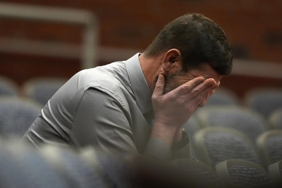 Sean Hodgson waits to be called to give testimony, Thursday, April 25, 2024, in Augusta, Maine, during a hearing of the independent commission investigating the law enforcement response to the mass shooting in Lewiston, Maine. Hodgson had alerted an Army supervisor in September that his friend, Robert Card, was capable to doing a mass shooting. (AP Photo/Robert F. Bukaty)